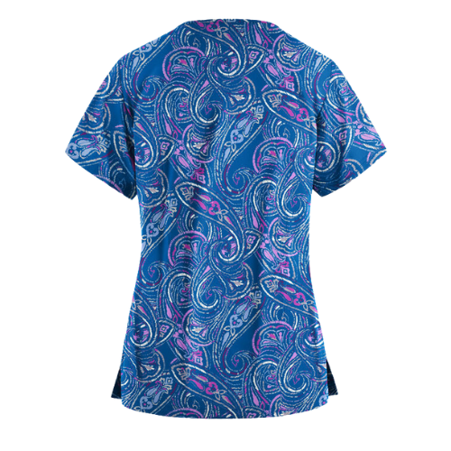 Blue and pink patterned scrub top on a white background